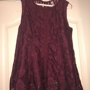 Maroon flowing tank